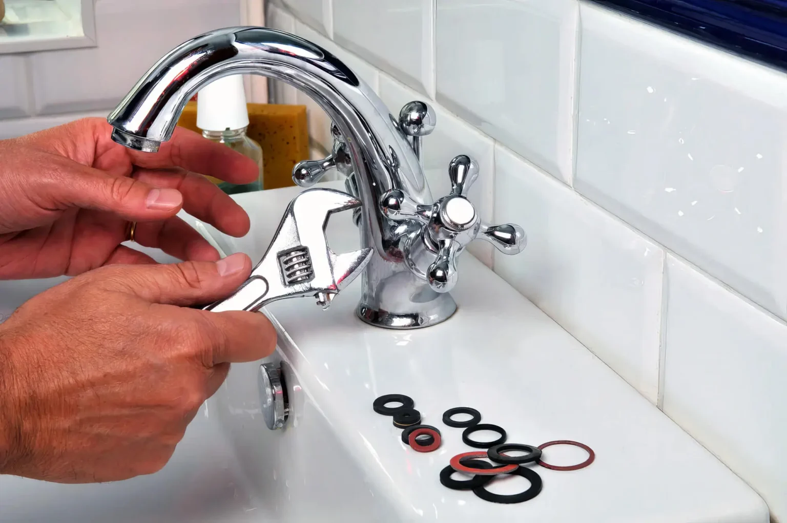 Plumber maintaining a bathroom faucet in Carmichael
